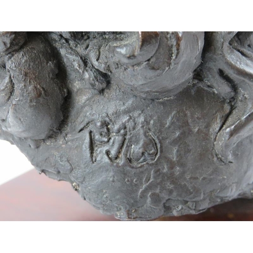 167 - A large bronzed study of a female head, late 20th century. ‘PJW’ monogram to the reverse. Displayed ... 