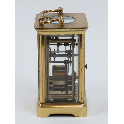 169 - A gilt brass carriage clock, late 19th/early 20th century. Housed within a brown leather box. Key in... 