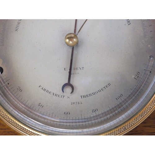 172 - A French oak cased gilt metal desk top combined aneroid barometer and thermometer by E J Dent of Par... 