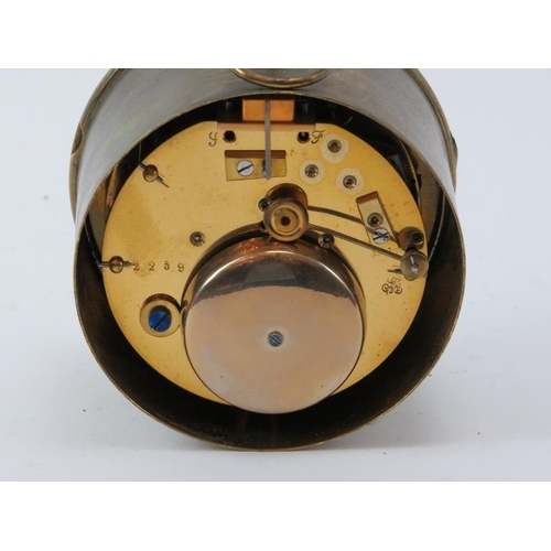 173 - A brass cased desktop chiming drum clock, 19th/early 20th century. White enamelled dial with Roman n... 