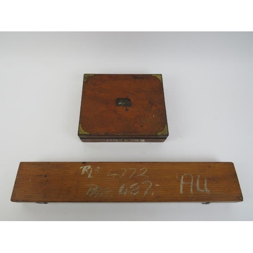 19 - Militaria: A vintage British Naval drawing set and parallel rolling rule. Both boxed, the drawing se... 