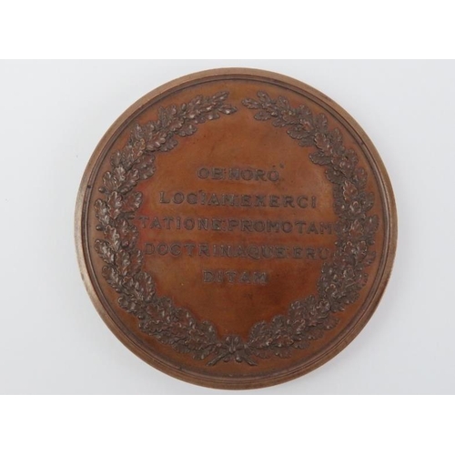 197 - A Victorian bronze British Horological Society medallion coin. Designed by J.J. Hall. Obverse decora... 