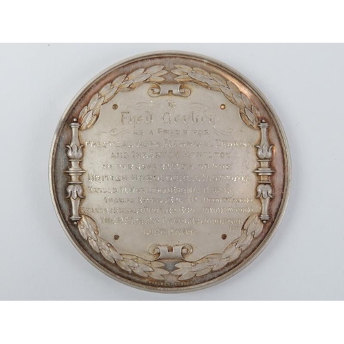 198 - A rare British finely engraved silvery metal medal presented by the Turners Company of London. Obver... 