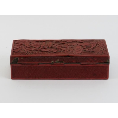 2 - A Chinese cinnabar lacquered box, 19th century. With a hinged cover decorated depicting sages and sc... 