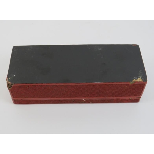 2 - A Chinese cinnabar lacquered box, 19th century. With a hinged cover decorated depicting sages and sc... 