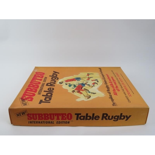 21 - A vintage Subbuteo Table Rugby New International Edition game. Box: 47 cm length.
Condition report: ... 