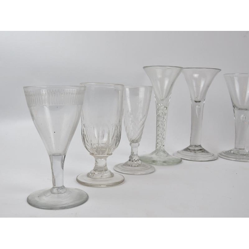 214 - A group of drinking glasses, late 18th/19th/early 20th century. Items include wine glasses, rummers ... 