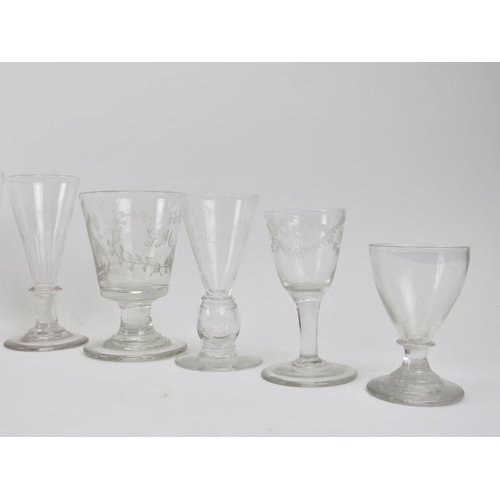 214 - A group of drinking glasses, late 18th/19th/early 20th century. Items include wine glasses, rummers ... 