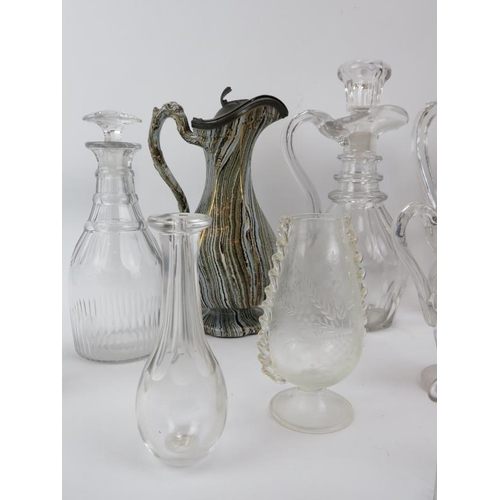 216 - A group of glassware and ceramic items, 19th/early 20th century. Decanters, jugs, a toddy lifter, a ... 