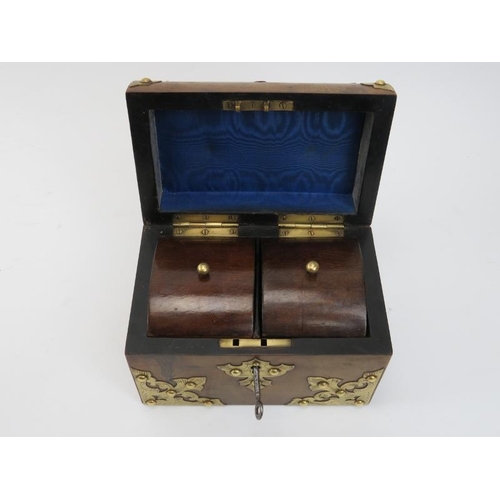 218 - A brass bound walnut domed tea caddy, 19th century. With compartmented interior. Key included. 17.8 ... 