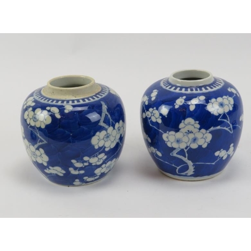 226 - Two Chinese blue and white porcelain blossoming prunus ginger jars, 19th century. Four character Kan... 