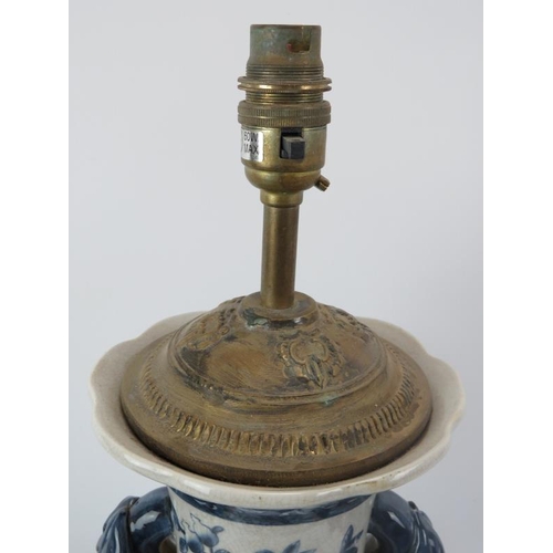 227 - A large ceramic lamp base with Pomegranate Tree decoration and Pomegranate form handles, standing on... 