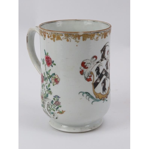 228 - A large Chinese Export Famille Rose Armorial ware tankard, 18th century. 16 cm height. 
Condition re... 