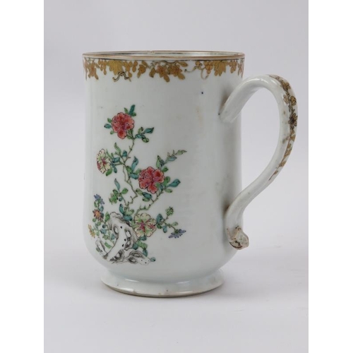 228 - A large Chinese Export Famille Rose Armorial ware tankard, 18th century. 16 cm height. 
Condition re... 