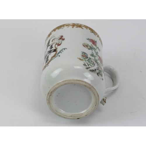 228 - A large Chinese Export Famille Rose Armorial ware tankard, 18th century. 16 cm height. 
Condition re... 