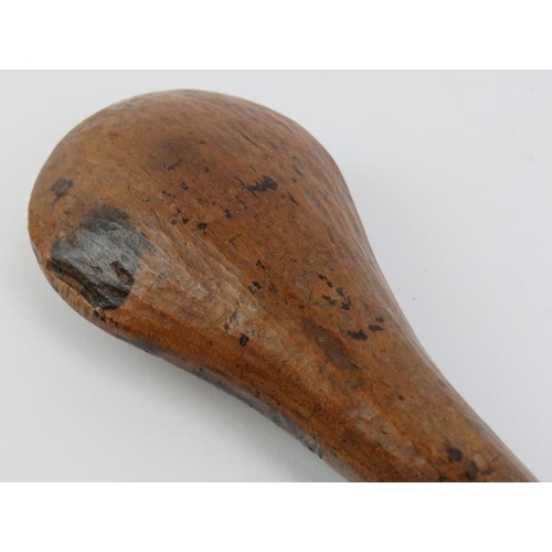 237 - A South Pacific hardwood club with incised decoration. 34 cm length. 
Condition report: Some age rel... 