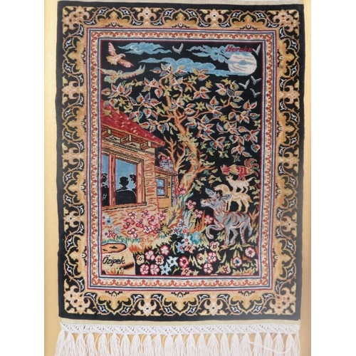 241 - A fine Turkish Ozipeck Ince miniature silk handfinish rug, silk on silk, framed and with original ce... 