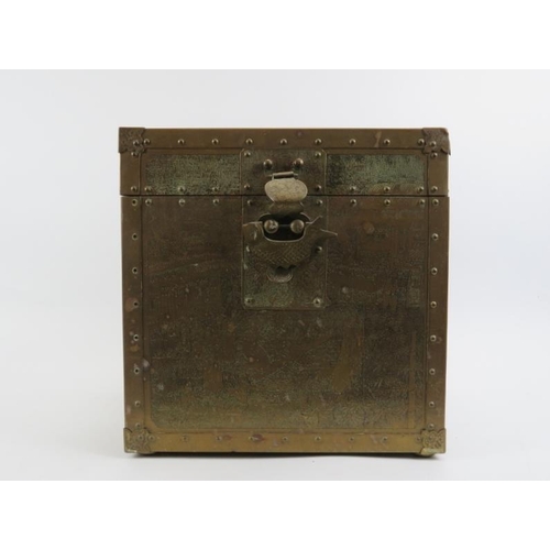 246 - A Japanese brass twin handled storage box, early 20th century. Brass exterior decorated with Japanes... 