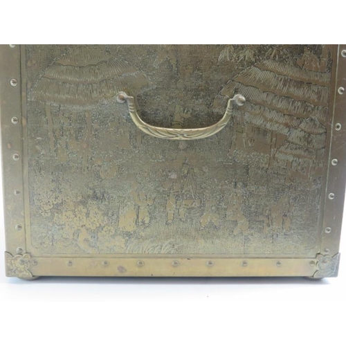 246 - A Japanese brass twin handled storage box, early 20th century. Brass exterior decorated with Japanes... 