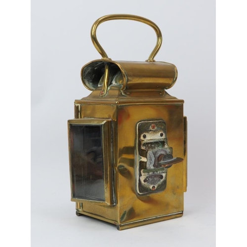 247 - A Victorian brass fire engine lantern by Merryweather & Sons Ltd of London. With convex red glass le... 