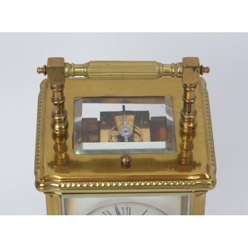 249 - A French gilt brass repeater carriage clock, 19th century. With a silvered dial and front plate, blu... 