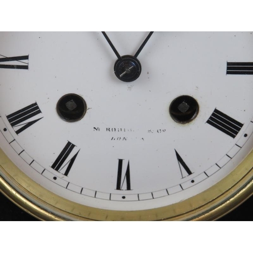 250 - A Victorian slate and marble mantel clock. With white enamelled dial and Roman numerals. French move... 