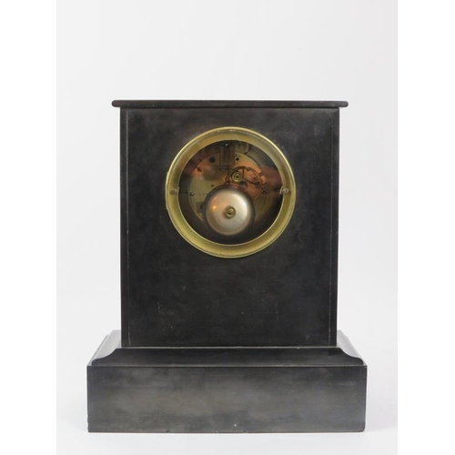 250 - A Victorian slate and marble mantel clock. With white enamelled dial and Roman numerals. French move... 