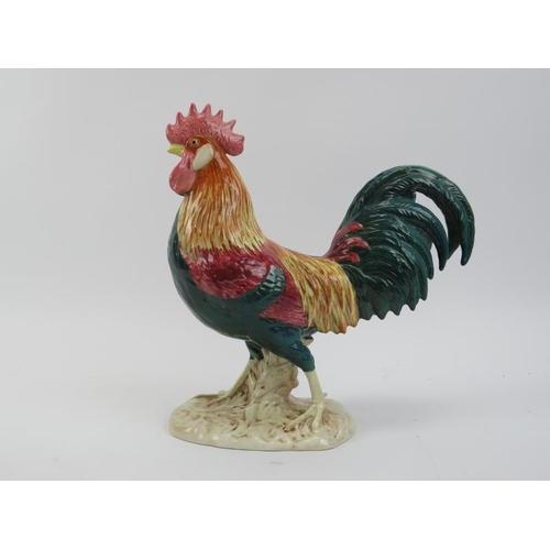 26 - A vintage Beswick ceramic model of a Leghorn cockerel. Model No. 1892 with factory marks beneath. 24... 