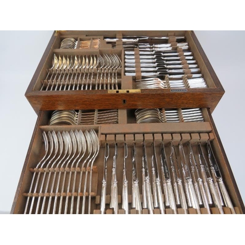 267 - A Mappin & Webb ‘Athenian pattern’ plated flatware cutlery canteen set with additional 4 rolls of fl... 