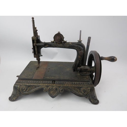 271 - An early 20th Century Muller child's sewing machine, a Brunonia Atlas sewing machine and a Singer 'M... 