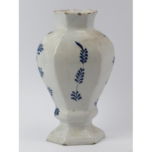 273 - A Dutch Delft blue and white ceramic vase, probably 18th century. 21.7 cm height. 
Condition report:... 