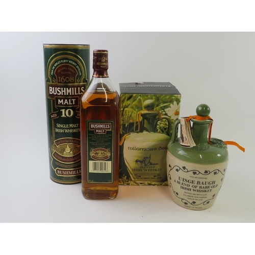 291 - 2 bottles: 1 litre bottle of Bushmills 10 year old single malt Irish whiskey, boxed, 100cl, 43% vol;... 