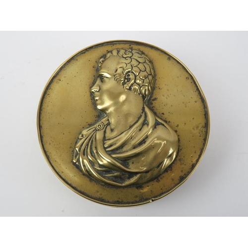 30 - An antique plated brass tobacco box, 19th century. The cover relief decorated with a Roman Emperor. ... 