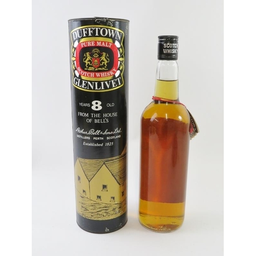 313 - A bottle of Dufftown Glenlivet 8 Year Old Single Malt Scotch whisky in tube. 26 2/3 fl.oz, 70 proof,... 