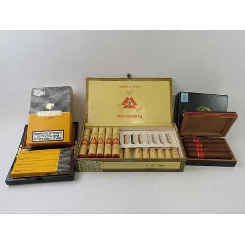 331 - Cuban cigars to include 17 MonteCristo Petit Tubos, 4 Cohiba Siglo IV in presentation box, and 4 Par... 