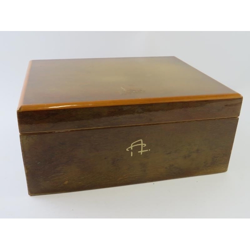 333 - A cedar wood cigar humidor with contents including a leather cigar case and various cigars and tubes... 