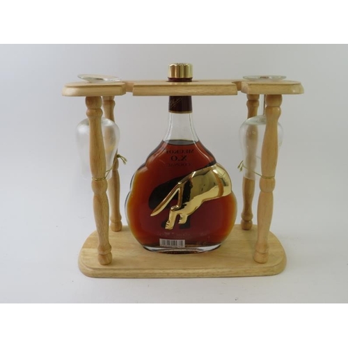 338 - A bottle of Meukow XO Cognac in presentation pack with stand and glasses. 70cl, 40% vol. Boxed.