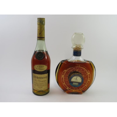 341 - Three bottles of Cognac to include: 1 litre of Camus Grande VSOP Cognac 40% vol, one bottle of Henne... 