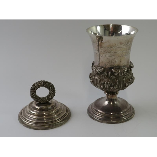 355 - A 19th century Dutch silver covered goblet of campana form with acanthus leaf decoration. The lid mo... 