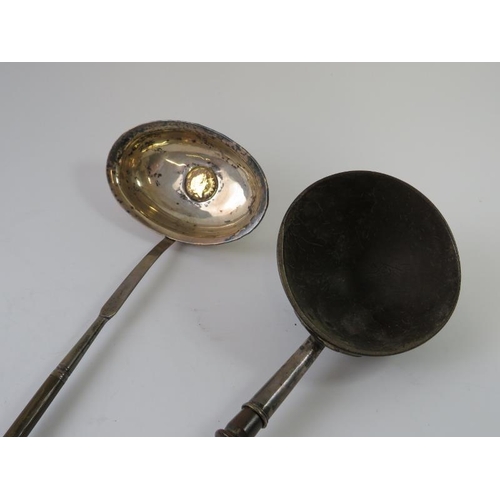 360 - An early 19th century toddy ladle with an inset George III 1801 gold third guinea coin, beleen handl... 