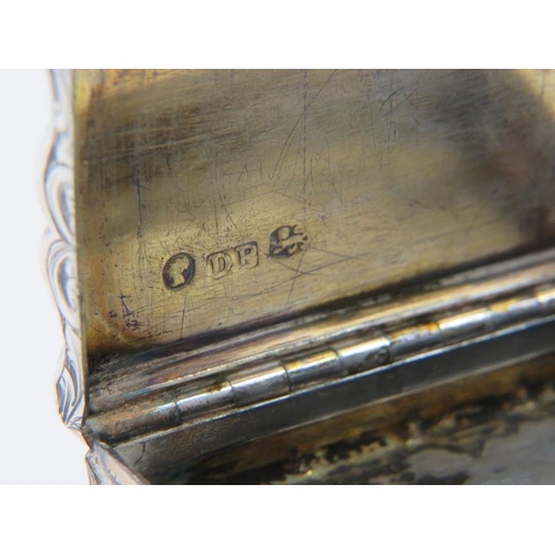 363 - A mid 19th century silver snuff box with overall foliate engraved decoration. Hallmarked for Birming... 