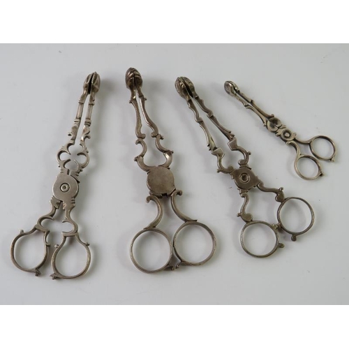 371 - Three pairs of Georgian hallmarked silver  sugar nips and a smaller unmarked pair. (4)
Gross combine... 