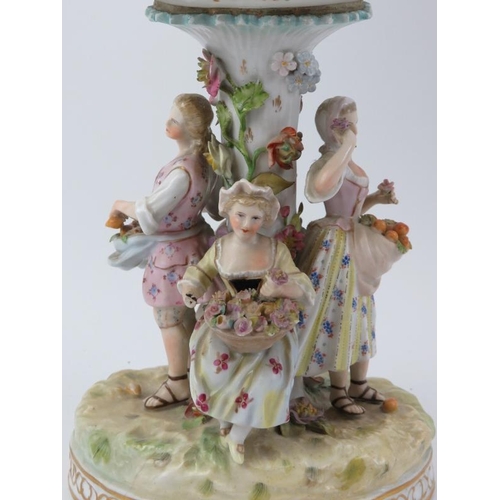 38 - A large German Dresden porcelain comport, circa 1888 - 1901. Modelled with figures surrounding the s... 