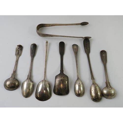 390 - 7 various silver spoons and a pair of silver sugar tongs. Spoons include egg, mustard and jam. (8) G... 