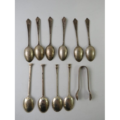 391 - 10 mixed silver coffee spoons including a set of 6 and a pair of silver sugar tongs. Various hallmar... 