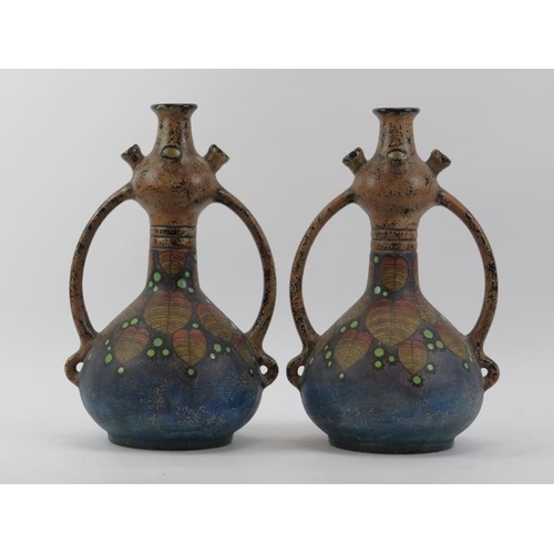 40 - A pair of Czechoslovakian Amphora twin handled pottery vases, circa 1930s. Factory marks beneath. (2... 