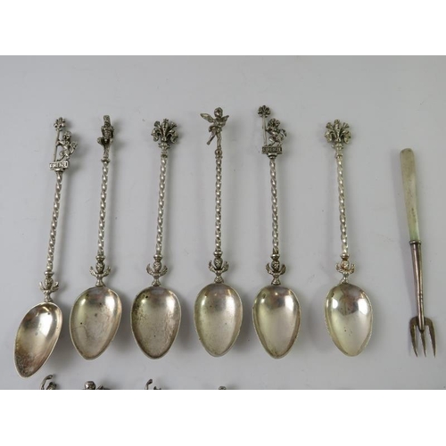 401 - A set of 11 Italian silver Firenze souvenir spoons marked .800, a similar unmarked pair of sugar ton... 