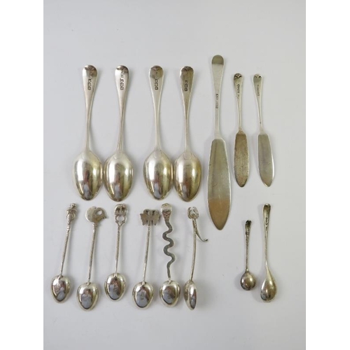 419 - A mixed lot of silver spoons and butter knives.  Various British hallmarks and a set of six Sri Lank... 