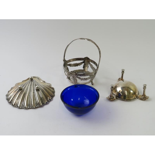 431 - A hallmarked silver scallop shaped dish on ball feet, a hallmarked silver tri-form ashtray and a sil... 