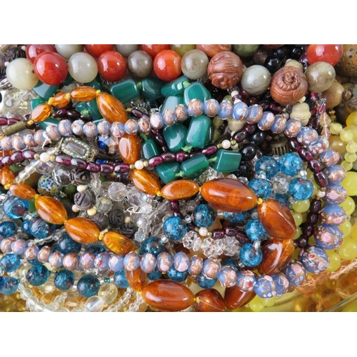 439 - A quantity of beaded necklaces to include faux amber, crystal, hardstone etc (qty)